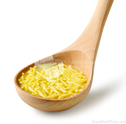 Image of chicken noodles soup in wooden ladle