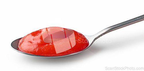 Image of spoon of tomato puree