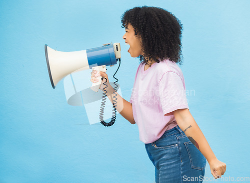 Image of Megaphone announcement, shout and angry black woman protest for democracy vote, justice or human rights rally. Racism speech, microphone noise or profile of studio speaker isolated on blue background