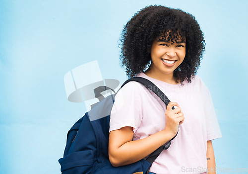 Image of Portrait, student and woman with backpack in studio for travel, abroad and future dream on blue background. Face, girl and foreign exchange student excited for journey, experience and opportunity