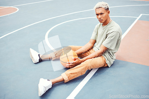 Image of Black man, basketball court and portrait for fashion, sports or outdoor fitness in summer sunshine. Urban man, basketball player or sport for wellness, exercise or workout with edgy clothes in city