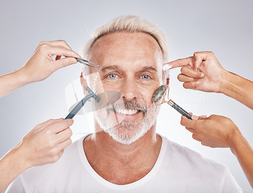 Image of Senior man, skincare and studio portrait with shaving, self care and jade roller guasha by gray background. Model, skin product and cream for beauty, cosmetics and happiness for anti-aging grooming