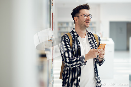 Image of Social media, thinking and man with a phone at college for school contact, education chat and learning communication at college. Email, internet and student typing an idea on a mobile at university