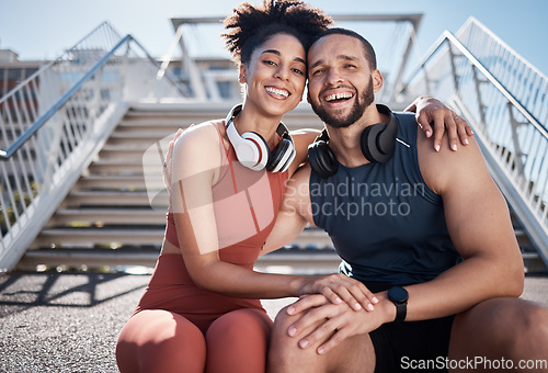 Image of Friends, fitness and portrait smile with hug in the city for break from running exercise, training or workout on steps. Happy man and woman smiling in relax for healthy cardio exercising outside