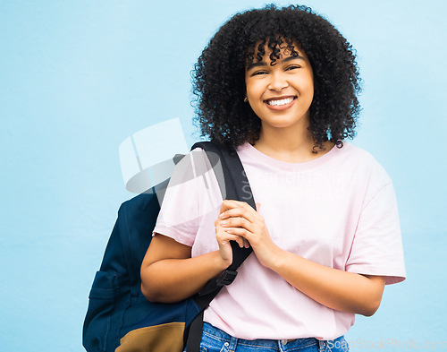 Image of Student, portrait and woman with backpack in studio for travel, abroad and future dream on blue background. Face, girl and foreign learner excited for journey, experience and education opportunity