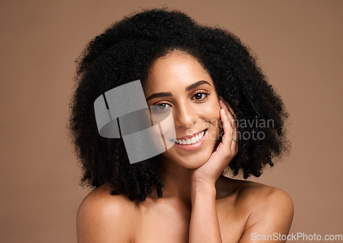 Image of Black woman, happiness portrait and skincare beauty afro hair care wellness, face glow and natural cosmetics dermatology in brown background studio. African model, smile and salon spa facial headshot