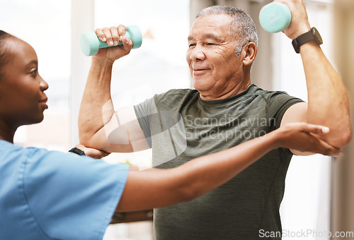 Image of Medical, training and physiotherapy with dumbbell and old man with nurse for rehabilitation, support and retirement. Healthcare, help and physical therapy with patient and black woman in nursing home