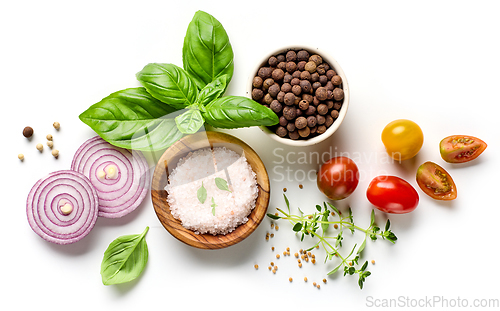 Image of composition of spices, tomato and basil