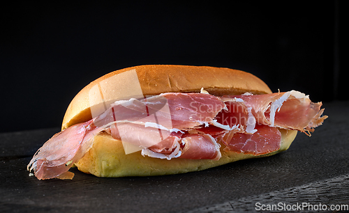 Image of sandwich with sliced spanish iberico ham