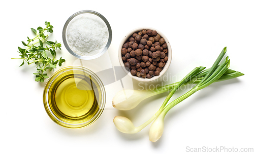 Image of oil, salt, pepper and herbs