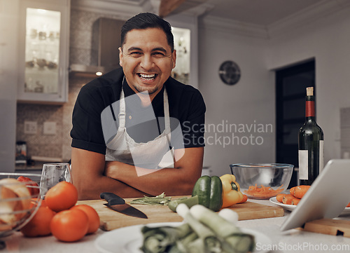 Image of Man, happy portrait and cooking in kitchen for healthy nutrition, food diet and organic vegetables salad. Young male, chef happiness and smile for green vitamins lifestyle or cook dinner in home