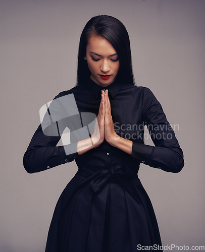 Image of Fitness tai chi, martial arts and woman with prayer hands in studio isolated on gray background. Face, karate meditation and female fighter with hand gesture ready for workout, exercise or training.