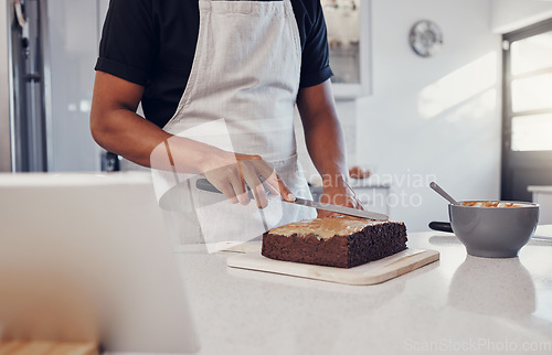 Image of Decoration, baking and man with a cake in the kitchen for birthday food, dessert and pudding. Cooking, preparation and baker learning to decorate a sweet treat for a celebration on a table in a house