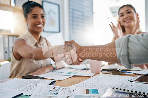 Image of Meeting, handshake and collaboration with a business black woman in the office for a deal or agreement. Teamwork, collaboration and thank you with a female employee shaking hands with a colleague