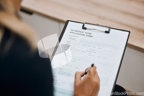 Image of Retirement home, application form or hand of woman writing personal information to register on paper or clipboard. Contract, compliance or person signing on registration paperwork or legal documents