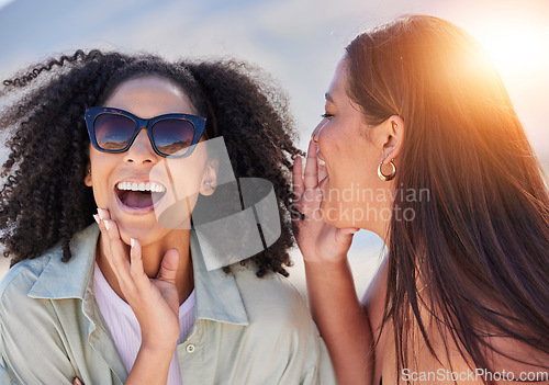 Image of Girl friends, whisper and happy communication of a woman with a secret laughing outdoor. Lens flare, friend conversation and summer holiday travel of people talking about a gossip story on vacation