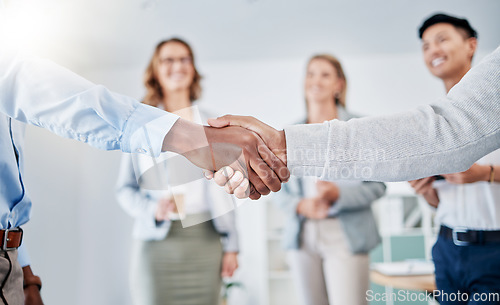 Image of Closeup, business people and handshake for partnership, collaboration and achievement with group project, sales growth and budget increase. Zoom, gesture for greeting and agreement for corporate deal
