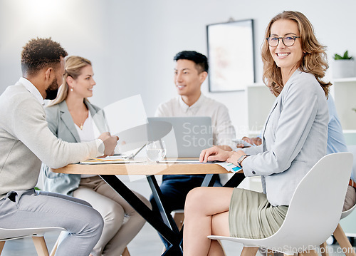 Image of Meeting, planning and collaboration with a business woman in the boardroom with her team for strategy. Manager, workshop and teamwork with a female leader training her staff during an office seminar