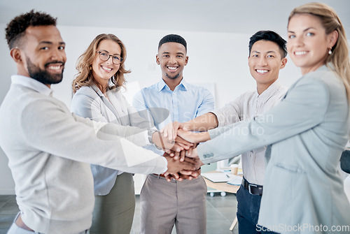 Image of Portrait, stack of hands and business people in celebration of success, achievement or goal. Happy, diversity and corporate team with smile to celebrate successful collaboration or teamwork in office