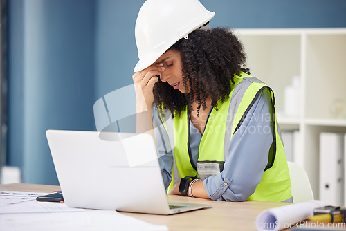 Image of Engineer, stress and black woman in office, laptop and anxiety for deadline, planning and financial crisis. Business, African American female and architect frustrated, headache or burnout for project