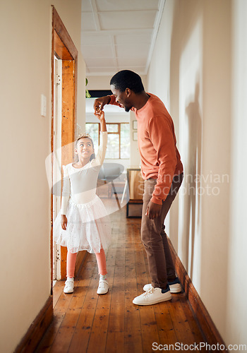 Image of Dance, happy and ballet father and daughter holding hands for learning, support and bonding. Princess, teaching and music with dad and girl in black family home for freedom, wellness and helping