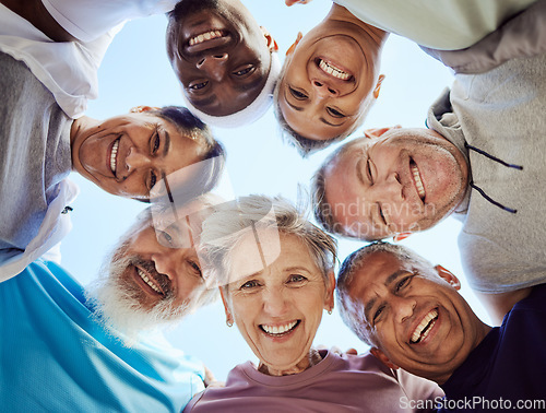 Image of Portrait, senior or friends with fitness goals, support or hope in huddle bonding in training, sports exercise or workout. Low angle, faces or happy elderly people with mission, team work or vision