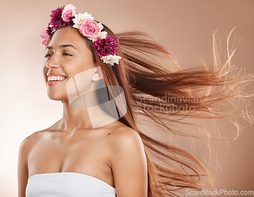 Image of Hair care, beauty and flower crown on woman for cosmetics, floral and natural skin on studio background. Headshot of aesthetic model posing for salon, health and wellness mockup with skincare