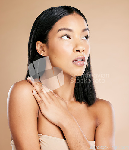 Image of Woman, skincare studio and thinking for natural makeup aesthetic, healthy or cosmetic glow by beige background. Model, facial beauty and cosmetics for skin, face or wellness for self love by backdrop