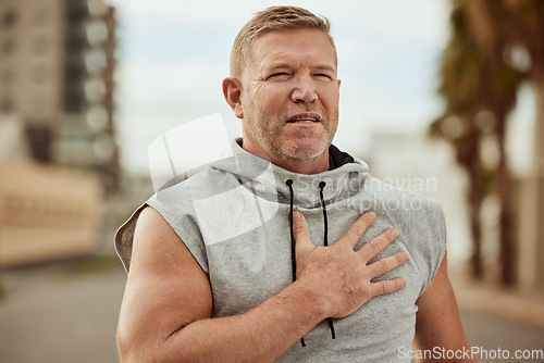 Image of Face, fitness and man with heart attack in city after running, workout or training accident. Sports, cardio health and mature male runner with chest pain, cardiac arrest or injury, angina or stroke.