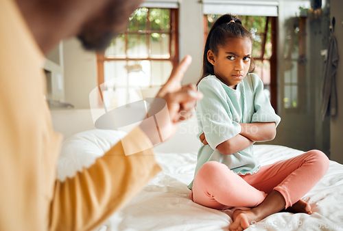 Image of Scolding, angry and kid on bed in home with unhappy, annoyed and tantrum expression. Serious conflict, problem and upset father in black family disappointed with young child in house.