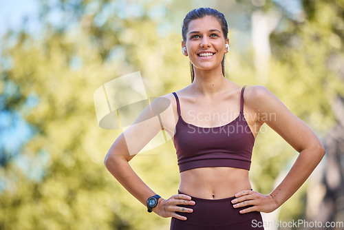 Image of Fitness, exercise and woman in nature smile to enjoy fresh air after running, marathon training and workout. Sports, relax and happy girl in park for wellness, cardio and healthy lifestyle outdoors