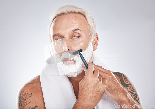 Image of Mature man face, shaving cream or grooming in self care maintenance or beauty aesthetic on gray studio background. Zoom, hair removal foam or model in facial razor cleaning or growth hygiene skincare