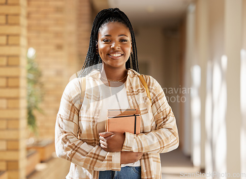 Image of Face, student portrait and black woman in university ready for learning, goals or targets. Education, scholarship and happy female learner from South Africa with books for studying and knowledge.