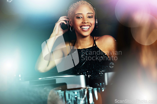 Image of Black woman, nightclub dj and party portrait with happy, excited face and glitter aesthetic by light. New year celebration, club event and gen z girl with music, festival and happiness for freedom