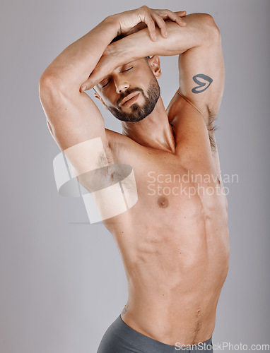 Image of Wellness, beauty and skincare body of man with muscular arms for masculine cosmetic campaign. Grooming, hygiene and aesthetic of healthy and attractive model in gray studio background.