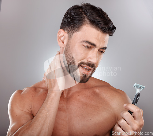 Image of Razor, beauty or man in studio to shave beard in grooming marketing razor hair care products. Self care, studio background or healthy male model shaving for good skincare in morning routine treatment