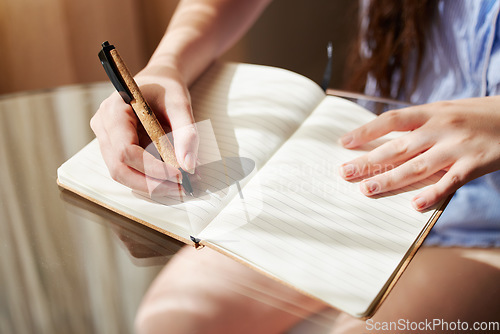 Image of Notebook, hands and woman with pen, journal and reflection with creative, ideas and thinking for writing. Writer closeup, inspiration and write list, planning and brainstorming with notes and paper