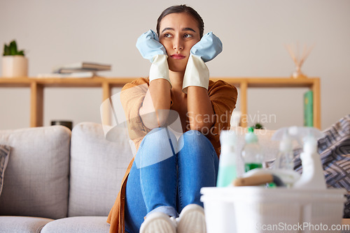 Image of Tired, sad and woman cleaning home overwhelmed, stressed and moody thinking of tasks. Spring cleaning fatigue of young girl thoughtful in house living room with cleaner hygiene products