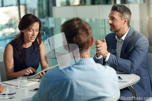 Image of Business people, meeting and discussion for corporate strategy, marketing or advertising at the office. Group of employee workers in business meeting, team planning or collaboration at the workplace