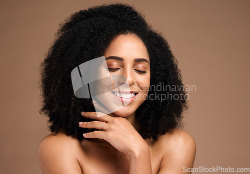 Image of Hair, afro and face of black woman with skincare glow, natural cosmetics and clean shampoo hair care. Wellness, spa salon and African person with luxury makeup, dermatology treatment and self care