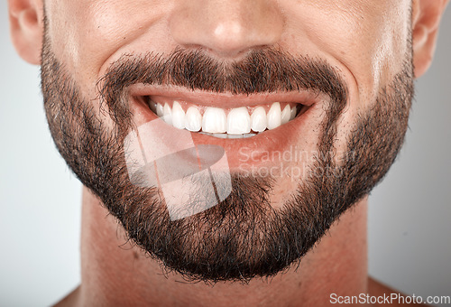 Image of Smile, mouth and teeth whitening of man on studio background of wellness. Closeup male model face with clean dental, fresh breath and happy tooth implant, aesthetic beauty or healthy cosmetic results