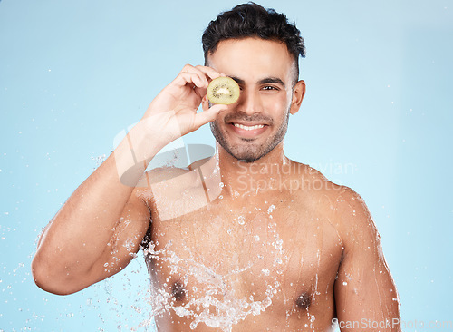 Image of Skincare, beauty and water splash, man with fruit for vitamin c facial detox for healthcare, natural healthy skin and smile. Water, wellness and sustainability, organic luxurycleaning and grooming.