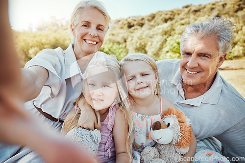 Image of Love, selfie and grandparents with girls in park, smile or loving together for vacation, break or bonding. Portrait, granny or grandfather with granddaughters outdoor, playful or happiness on holiday