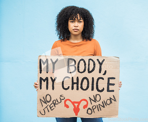 Image of Feminism, protest and portrait of a woman with a sign for human rights, abortion or political opinion. Strong, march and female from Mexico with a feminist board for change, empowerment and equality.