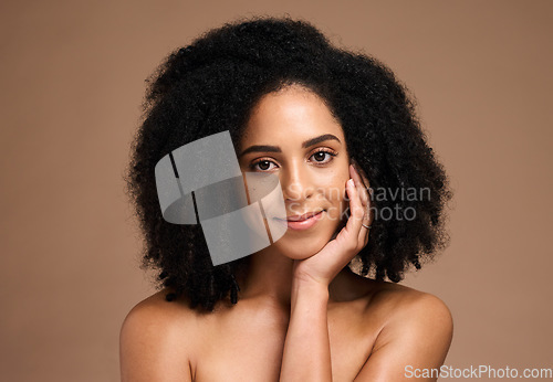 Image of Black woman, smile portrait and skincare beauty wellness, facial care glow and natural cosmetics dermatology in brown background studio. African model, happiness and luxury afro hair care headshot