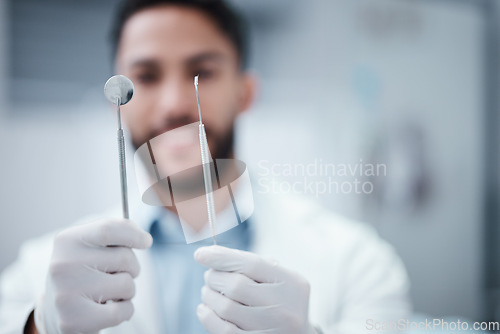 Image of Mouth mirror, excavator or dentist hands in healthcare wellness checkup, teeth surgery or annual dental maintenance. Zoom, orthodontist or man with metal tools for teeth cleaning exam or hygiene help