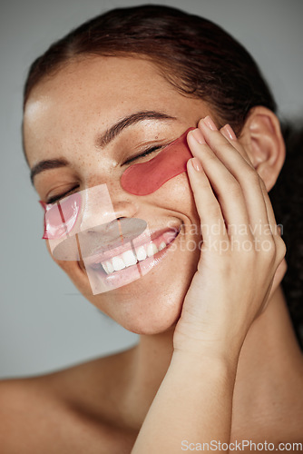 Image of Black woman, eyes patch and facial beauty wellness, cosmetics dermatology and closed eye or skincare treatment happiness. African model, smile and glowing skin or spa facial mask product in studio