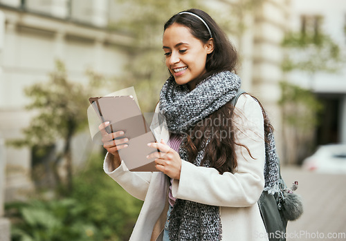 Image of Social media, digital writing and travel woman working and watching a video on a city street. Online communication, happy and young student in urban outdoor from Brazil smile about 5g screen message