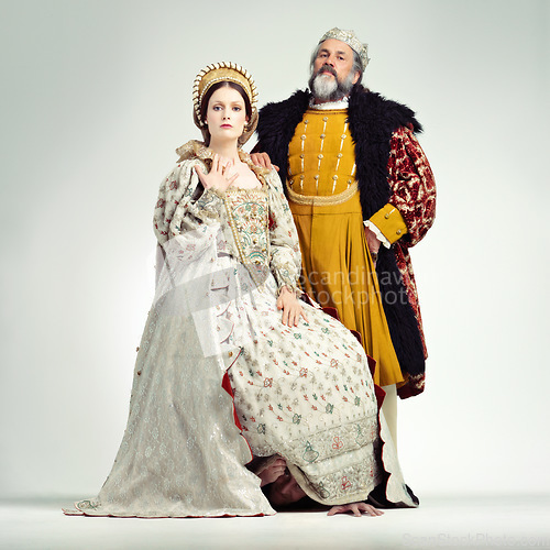 Image of Fashion, medieval and king with queen on a white background for power, leaders and ruler. History, theatre and royal couple portrait in vintage, renaissance and Victorian cosplay isolated in studio