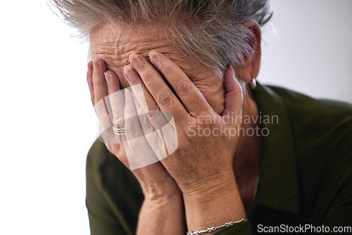 Image of Senior woman, cover face with hands and sad for diagnosis, mental health and shocking news. Mature female, elderly lady and emotional with stress, depression and results for fatal illness or sickness